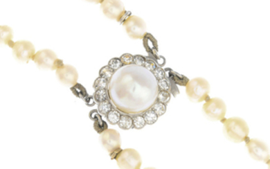 An early 20th century natural pearl two-row necklace, with pearl and diamond clasp.