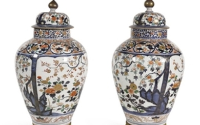 A pair of gilt-bronze mounted Japanese Imari baluster vases and covers, Edo period, late 17th/early 18th century, the mounts probably Viennese, 19th century