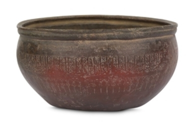 A LARGE COPPER BOWL WITH KUFIC INSCRIPTIONS Iran,...