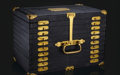 A LEATHER AND BRASS JEWELRY TRUNK