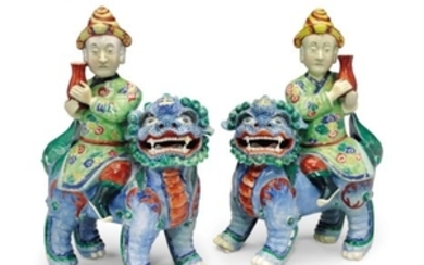 A RARE PAIR OF ATTENDANTS RIDING MYTHICAL BEASTS, QIANLONG PERIOD (1736-1795)