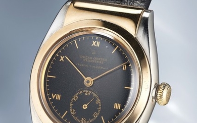 Rolex, Ref. 3064 A remarkable, impressive and extremely rare yellow gold and stainless steel wristwatch with black dial