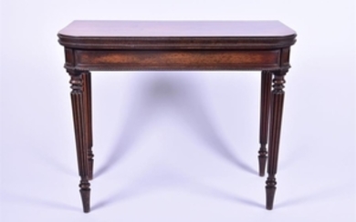 A Victorian rosewood fold-over card table with beaded borders in the Regency manner, opening to reveal an inalaid green...