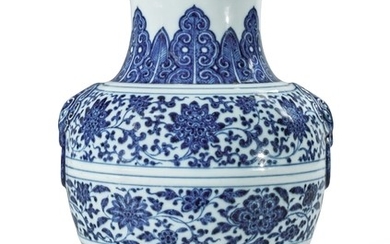 A FINE BLUE AND WHITE 'FLORAL' HU VASE QIANLONG SEAL MARK AND PERIOD