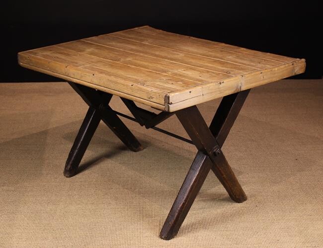 A 19th Century Tavern Table. The pine planked rect
