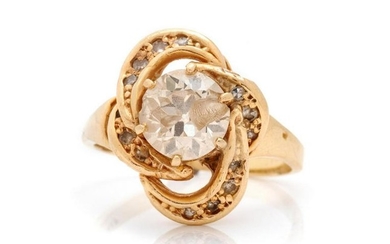 A 14 Karat Yellow Gold and Diamond Ring