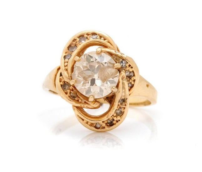 A 14 Karat Yellow Gold and Diamond Ring