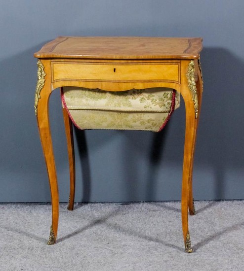 A 19th Century French Satinwood Rectangular Worktable, of slight...