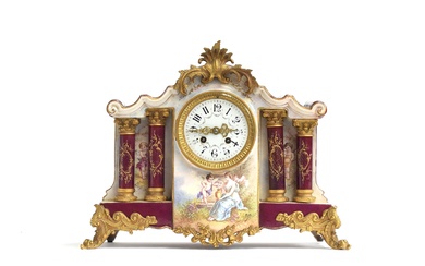 A 19th century French ormolu and porcelain mantel clock, the...