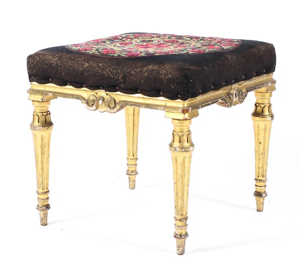 A 19th century giltwood footstool