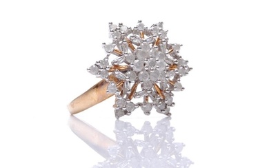 A 9ct hallmarked diamond cluster ring modelled as a snowflak...