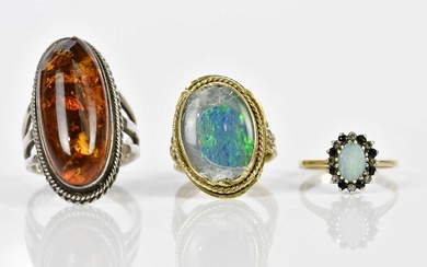 A 9ct yellow gold opal dress ring, size K, approx....