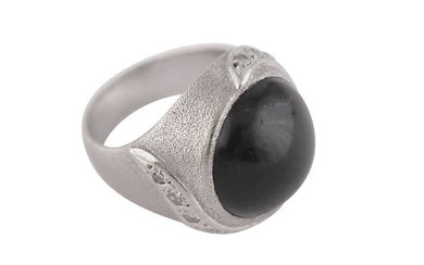 A BLACK STONE AND DIAMOND RING