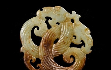 A CARVED JADE DRAGON PENDANT.MING PERIOD