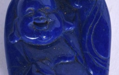 A CHINESE CARVED LAPIS BOULDER, forming a grinning
