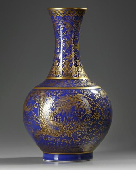 A CHINESE POWDER BLUE AND GILT BOTTLE VASE, QING