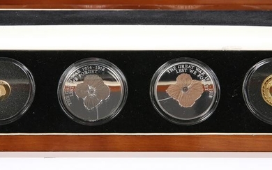 A COMMEMORATIVE PROOF COIN SET, "THE LEST WE FORGET