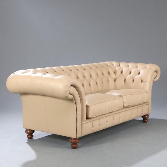 SOLD. A Chesterfield sofa with cream coloured leather cover. Early 21st century. L. 225 cm. – Bruun Rasmussen Auctioneers of Fine Art
