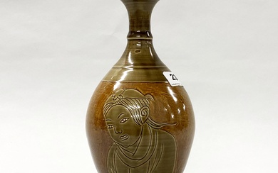 A Chinese Ming Dynasty style incised and olive green glazed porcelain vase, H. 27cm.