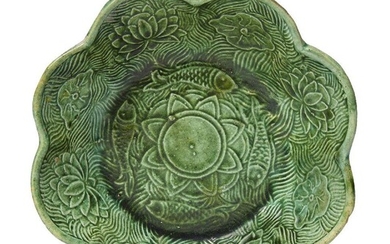 A Chinese green-glazed pottery 'lotus pond' lobed bowl, Liao dynasty,...