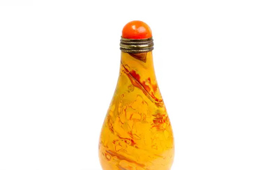 A Chinese imitation-realgar glass snuff bottle Late Qing dynasty Standing on a...