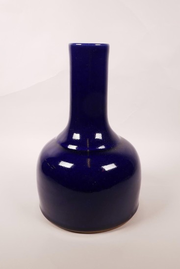 A Chinese powder blue glazed pottery mallet shaped vase, 6 c...