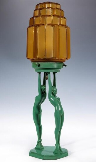 A FRANKART ART DECO LIGHT SUPPORTED BY NUDE FIGURES