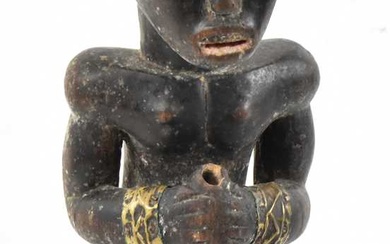 A Fang reliquary figure, Gabon, applied with brass detail and...