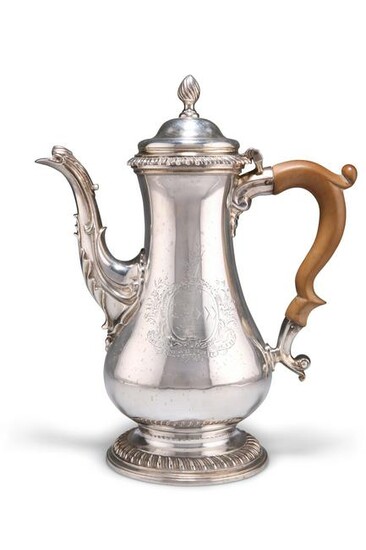 A GEORGE III SILVER COFFEE POT, by Thomas Whipham &