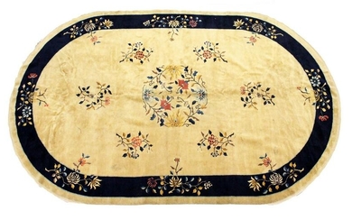 A GOOD CHINESE OVAL CARPET, beige ground with floral