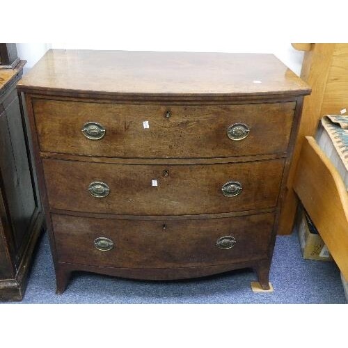 A George III mahogany bow-front Chest-of-Drawers, three long...