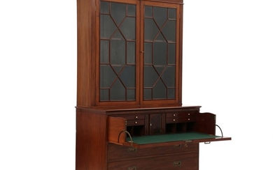 A George III mahogany secretary bookcase. England, late 18th century. H. 232 cm. W. 122 cm. D. 58 cm.