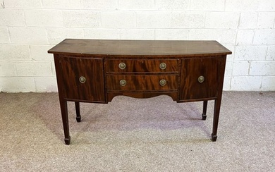 A George III style mahogany bowfront sideboard, circa 1900, with two drawers and two cupboards, on tapered legs, 91cm high, 153cm wide