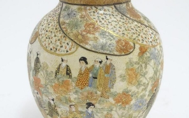 A Japanese Satsuma vase with hand painted decoration