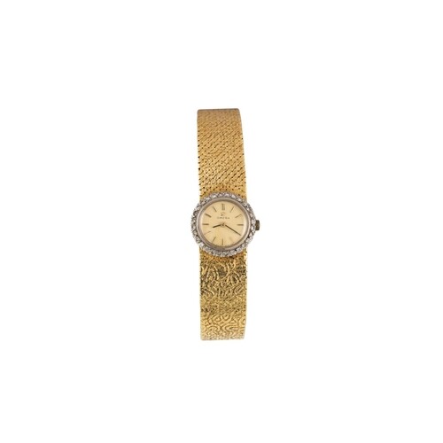 A LADY'S VINTAGE 18CT GOLD OMEGA COCKTAIL WRIST WATCH, textu...