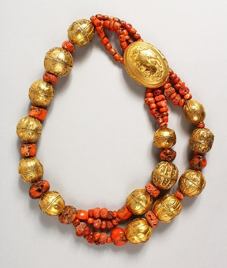 A LARGE SILVER GILT AND CORAL NECKLACE with an oval