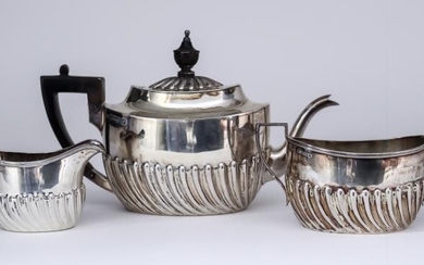 A Late Victorian Bachelors Silver Oval Three Piece Tea...