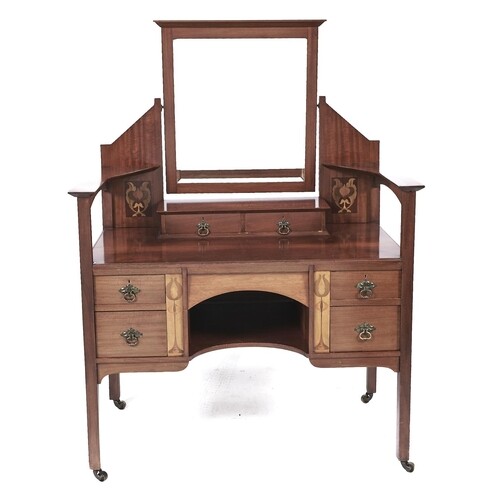 A Liberty style inlaid mahogany dressing table, late 19th c,...