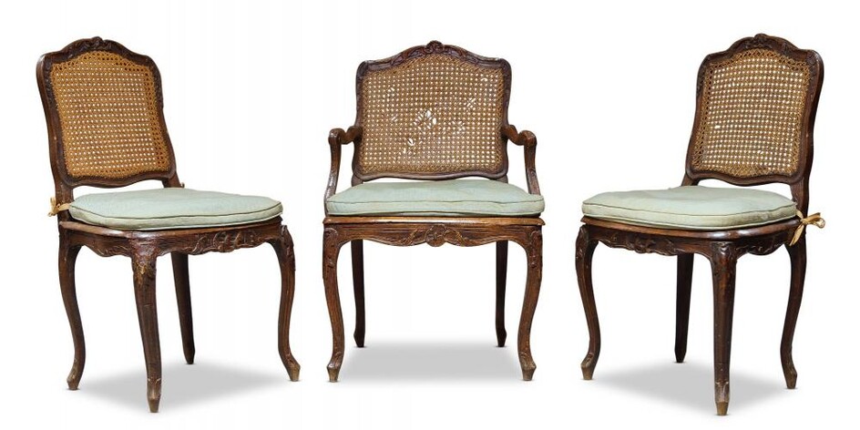 A Louis XV beech and caned fauteuil,...