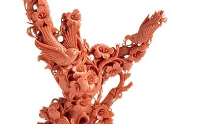 A Momo or Cerasuolo coral (Corallium Elatius) sculpture depicting a...