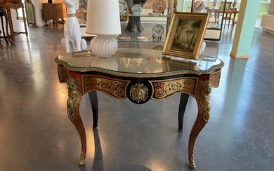 A Napoleon III period middle table opening with a drawer...