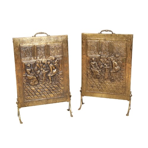 A PAIR OF BRASS FIRE SCREENS 19th century, decorated with pe...