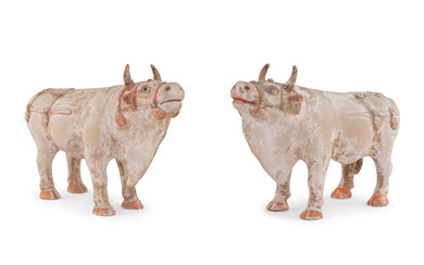 A Pair of Chinese Painted Pottery Figures of Oxen