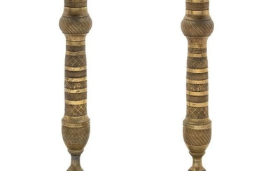 A Pair of Empire Style Brass Candlesticks