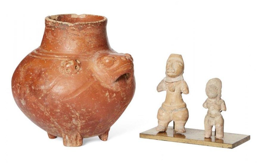 A Pre-Columbian red glazed pottery tripod vessel,...