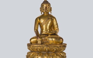 A Rare Gilt Bronze Figure of Shakyamuni, Tibet 13-14th Century.