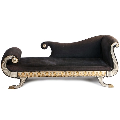 A Regency style chaise long, having a silvered scroll reeded...