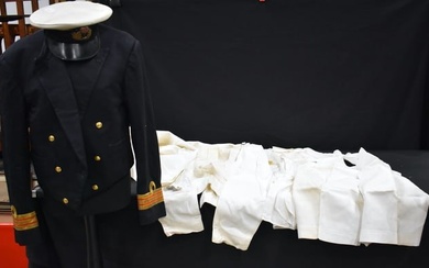 A Royal Navy dress uniform together with a cap and a selection of trousers, shirts,collars etc (Qty)