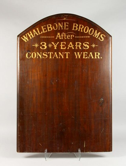 A STAINED WOOD ADVERTISING BOARD, with gilt lettering