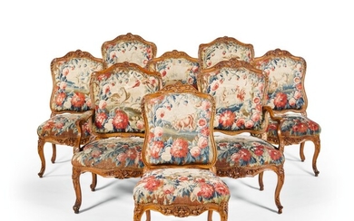 A SUITE OF LOUIS XV CARVED WALNUT SEAT FURNITURE CIRCA 1750, BY JEAN GODO, LYON